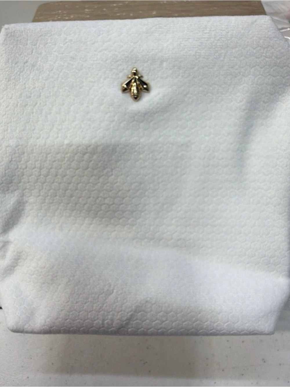 GUERLAIN white makeup bag gold accent. No box